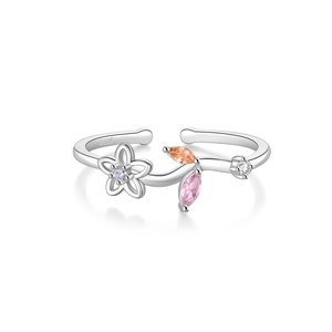 Macro detail of S925 sterling silver ring with colorful floral petals and S925 hallmark