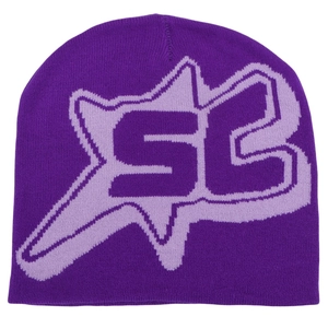 Detail view of the thick purple knitted beanie fabric with star and letter patterns