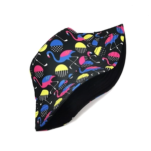 Reversible flamingo print bucket hat with vibrant tropical patterns for summer vacations