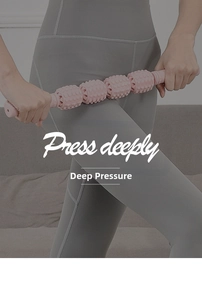 Pink foam roller stick with gears for deep tissue leg muscle massage and recovery