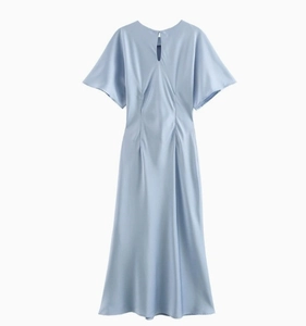 Detail of light blue satin dress featuring a teardrop cutout neckline and flared sleeves