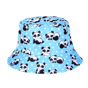 Detail of light blue reversible bucket hat with white polka dots and panda prints