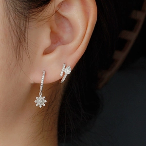 Elegant S925 sterling silver snake earrings with zircon stones and sunburst charms