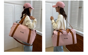 Pink canvas gym bag with Hayun logo featuring adjustable straps and large storage