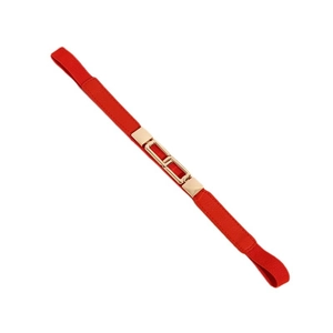 Slim elastic red belt for women with elegant interlocking gold metal buckle on white background