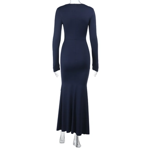 Detail of the elegant dark blue long-sleeve bodycon dress with ruffled mermaid hemline