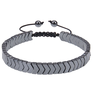 Detailed view of adjustable black hematite arrow bead bracelet with braided cord