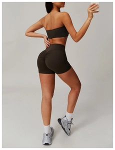 Close-up of high-waist scrunch yoga shorts and sports top with a lift effect