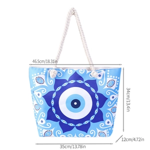 Detailed dimension chart showing size 46.5x34x12cm for the evil eye beach tote bag