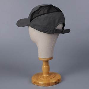Dark grey quick-dry mesh baseball cap with breathable side panels and adjustable metal buckle