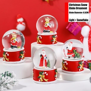 Detail of 6.5cm Santa Claus crystal ball with light, automatic snow, and red resin base
