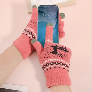 Pink winter knitted touchscreen gloves with black reindeer silhouette and snowflake pattern