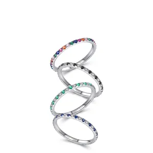 Stack of four S925 sterling silver minimalist rings with colorful micro-set zircons