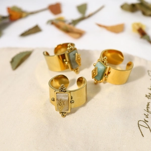 Vintage gold stainless steel star ring with natural gemstone in a bohemian style