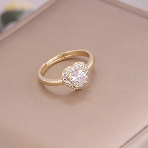 Macro shot of 18K gold plated heart ring with micro-pave cubic zirconia crystals