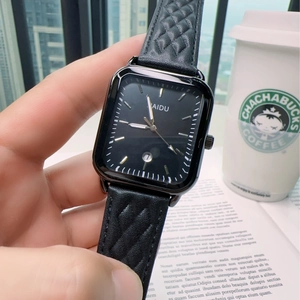 Elegant square quartz watch with black quilted leather strap and gold hands
