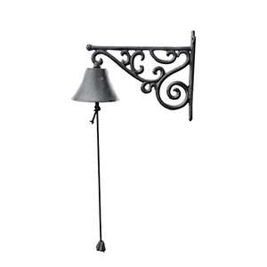 Vintage European style cast iron wall mounted doorbell with ornate scroll bracket decoration