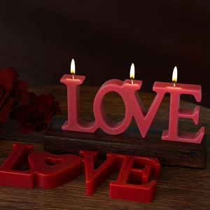 Romantic LOVE scented candles in red and pink for weddings or Valentine gift decor