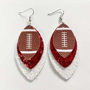 Detail of layered teardrop football earrings with brown faux leather and red glitter