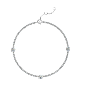 S925 sterling silver tennis bracelet featuring three moissanite stones on a white background