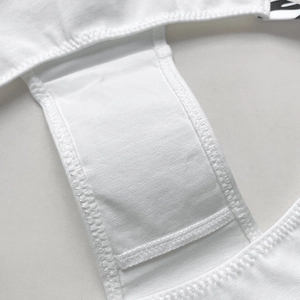 Close-up of white cotton V-cut panties with high-quality double stitching and soft texture