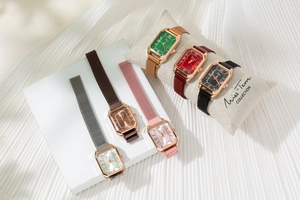 Close-up of elegant rectangular quartz watches with magnetic mesh straps in various colors