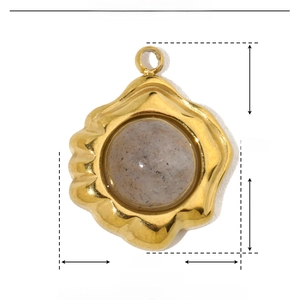 Macro detail of geometric marquise natural stone pendant with size measurements