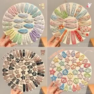 Assorted colorful hair clips for girls in floral and polka dot patterns set of four