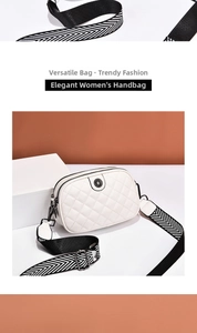 Detail of white quilted crossbody bag with stylish wide woven strap and metal logo decoration