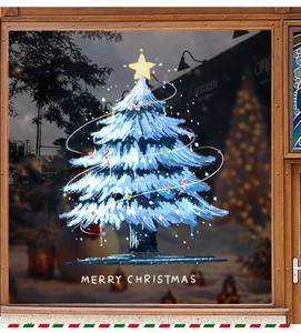 Close-up of blue hand-drawn Christmas tree window sticker with Merry Christmas greeting