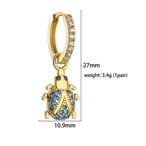 Gold beetle huggie hoop earrings with blue pavé gems and letter A pendant, 27mm height