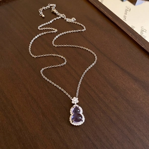 Elegant silver necklace featuring a purple gourd pendant with zircon snowflake accents