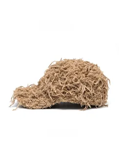 Side view of fuzzy khaki plush baseball cap showing long tassel fur and hip-hop style