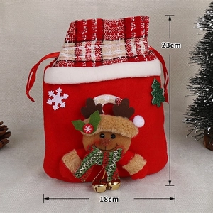 Detailed view of plush reindeer Christmas gift bag with dimensions 23cm by 18cm