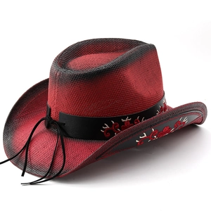 Detail of red and black gradient western cowboy hat with ethnic floral embroidery trim