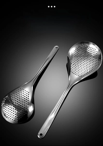Set of two stainless steel skimmers with uniform drainage holes and polished finish