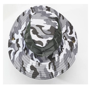 Detail of camouflage sun hat featuring breathable mesh top and metal side snap buttons