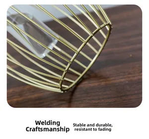 Close-up of golden lantern hydroponic vase showing sturdy welding and durable metal craft