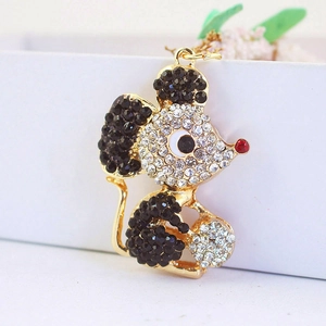 Sparkling crystal mouse keychain in gold finish with clear and black rhinestones