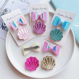 Cute bow and shell hair clips set for girls featuring sequins and metal duckbill clips