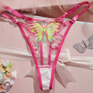 Detailed butterfly embroidery on vibrant pink lace thong with adjustable side straps