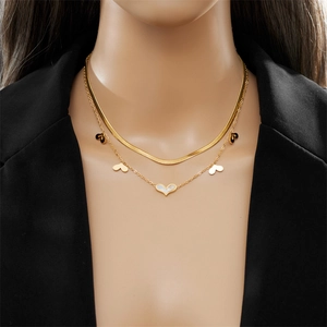 Double-layered gold titanium steel necklace featuring a flat snake chain and heart pendant