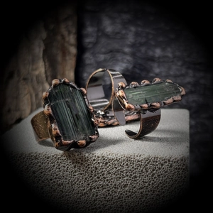 Vintage bronze adjustable ring featuring a natural raw green tourmaline stone