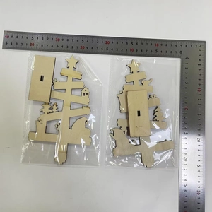Mini wooden Christmas tree decor dimensions shown with L-shaped metal ruler for size reference