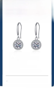 Detailed view of round Moissanite earrings in white gold plated s925 sterling silver