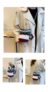 Detail of hand-crocheted contrast bucket bag with cherry charms and pearl shoulder strap