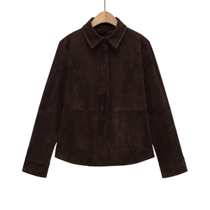Women's dark brown faux leather shirt jacket with lapel and long sleeves on a wooden hanger