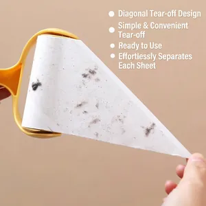 Manual lint roller with easy-tear slanted adhesive sheets and yellow handle