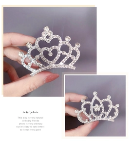 Close-up of silver rhinestone crown hair combs with sparkling heart and tiara designs