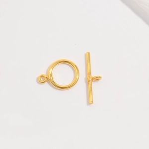 Close-up of golden S925 silver OT toggle clasp connector for DIY jewelry necklaces